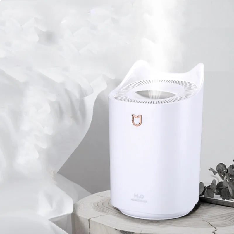 Double spray humidifier with USB cable and three mist outlets in coral pink colour