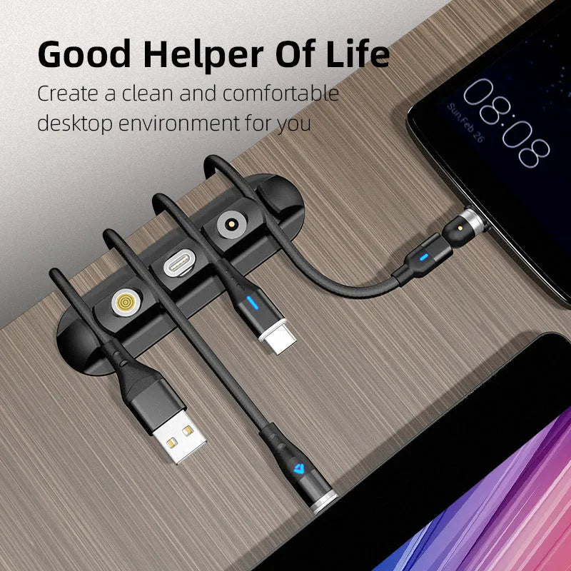 Black desktop magnetic cable organiser for charging cable storage and workspace organisation