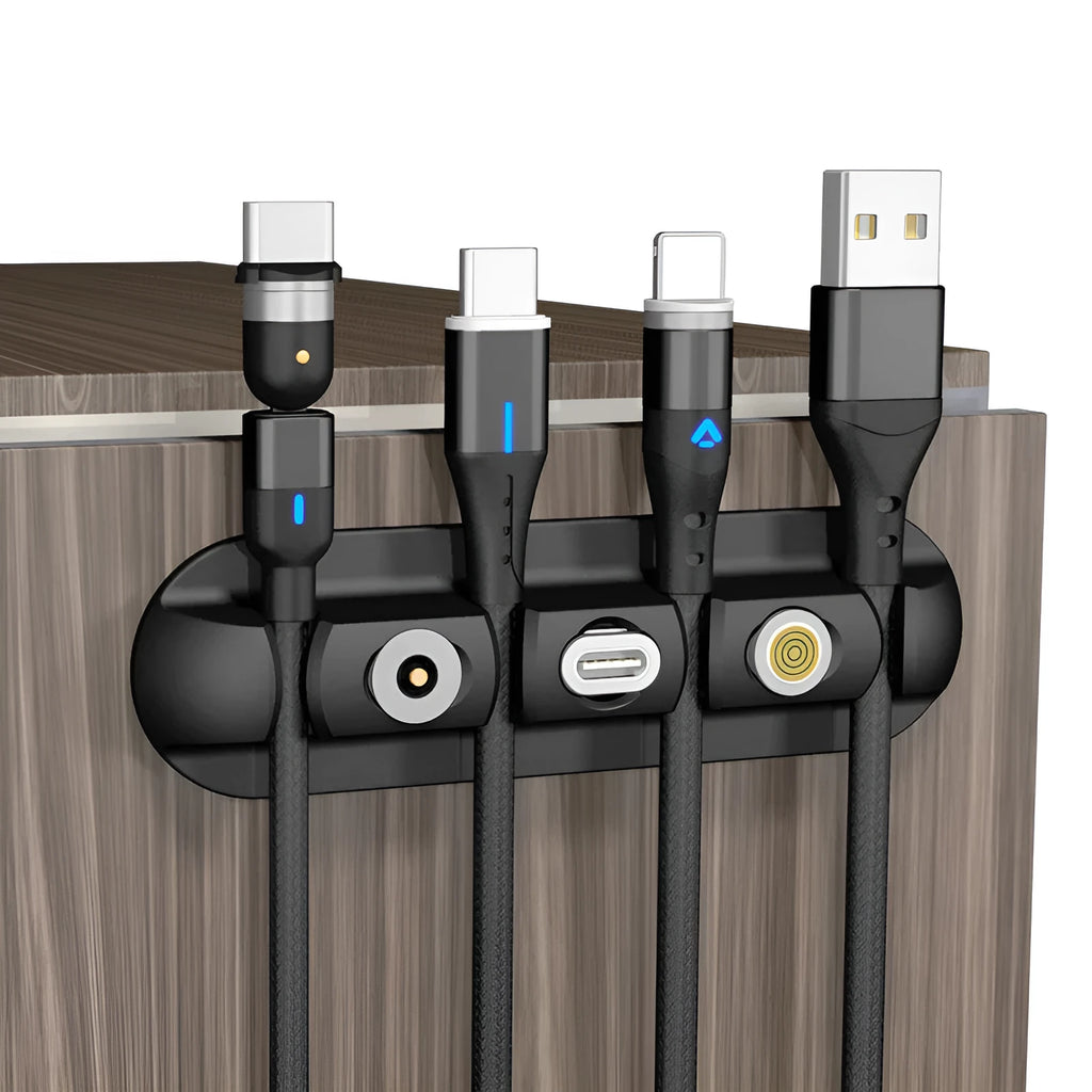 Black desktop magnetic cable organiser for charging cable storage and workspace organisation