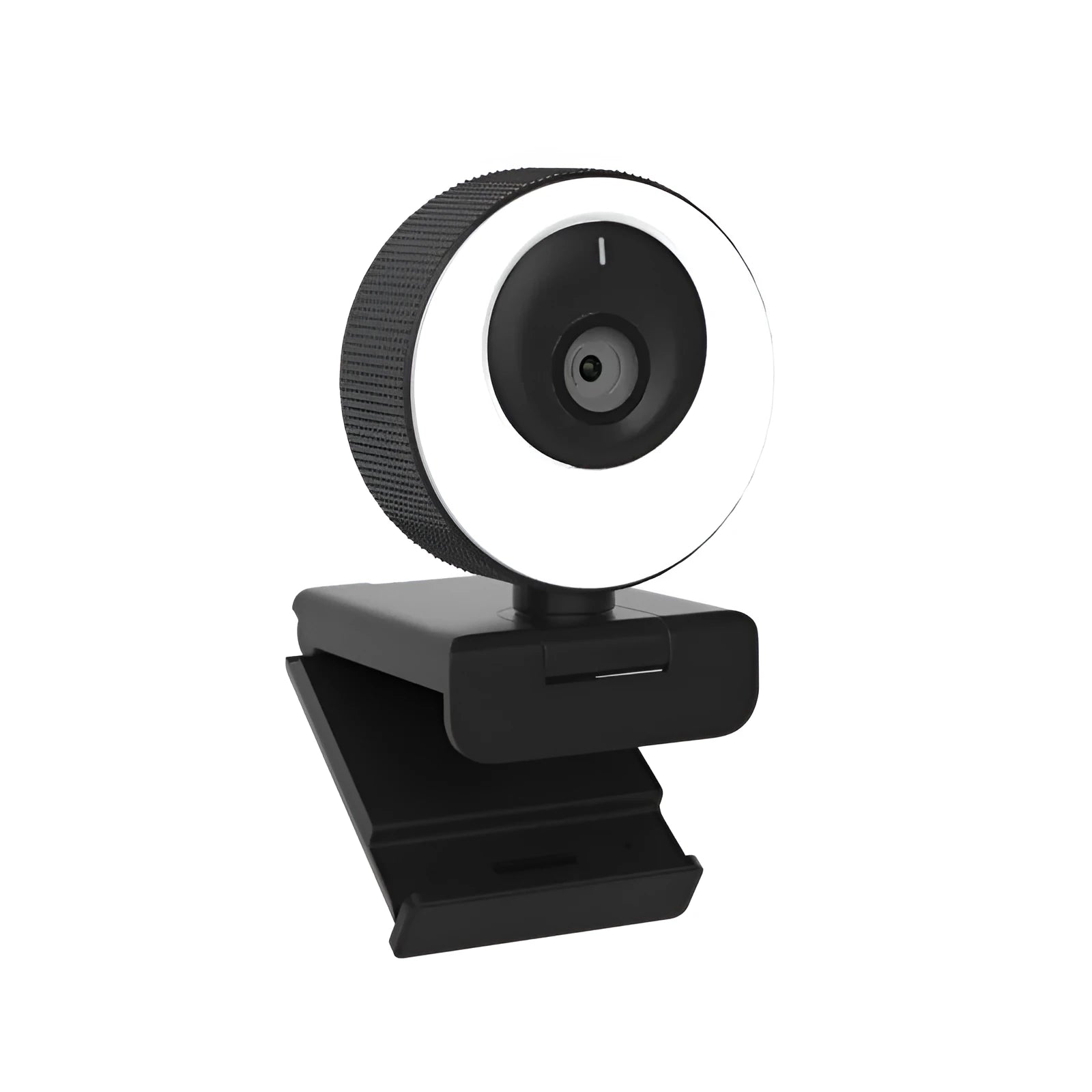 Black USB webcam with magnetic privacy cover on desktop next to computer monitor