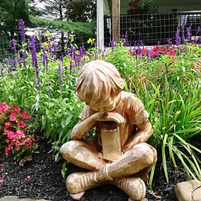 Brown natural resin tabletop figurine titled The Boy In The Garden decoration