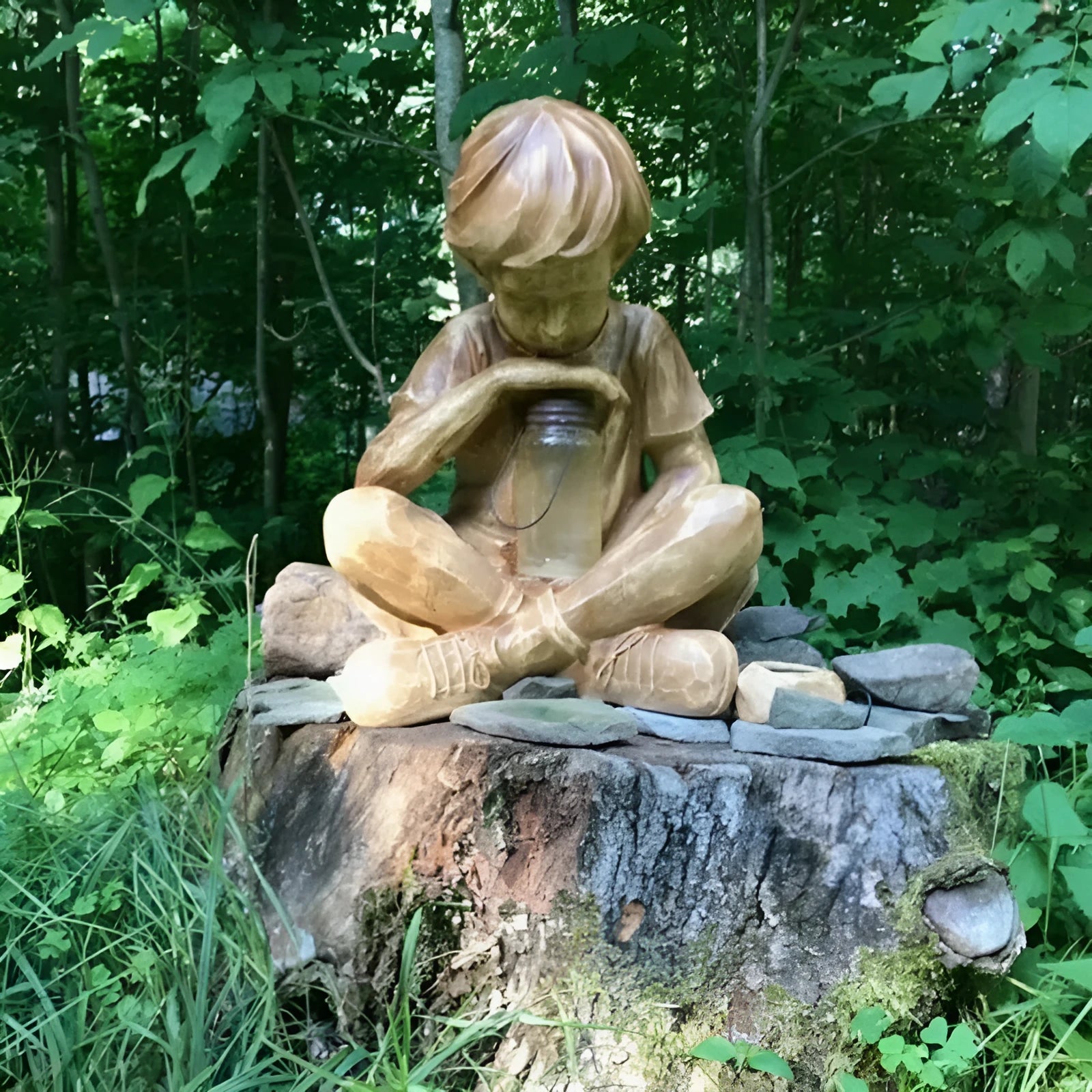 Brown natural resin tabletop figurine titled The Boy In The Garden decoration