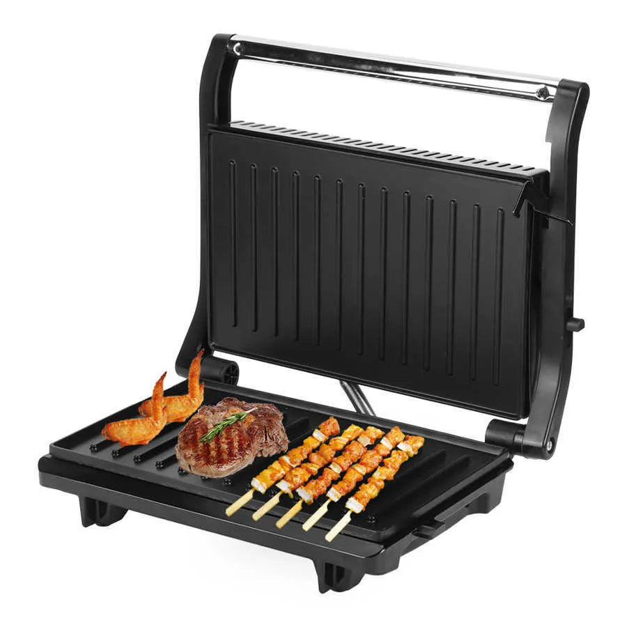 Nonstick electric steak maker grill with black casing, adjustable temperature knob, and wrap-around power cord on a kitchen worktop.