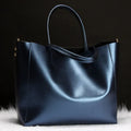 Women's cowhide leather handbag with shoulder strap in multiple colour options
