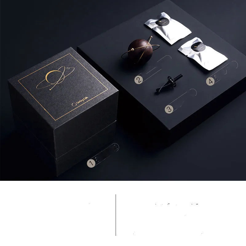 Wooden asteroid car diffuser clipping onto air vent with creative fragrance design