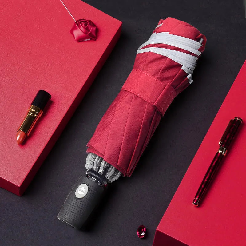 Automatic reverse umbrella with reflective cloth shown open, demonstrating 58cm span and 10-rib construction