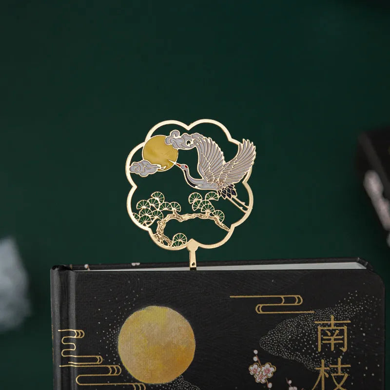 Chinese style feather pen set with metal sheath, 36 coloured refills, and Jianhegui notebook on a table.