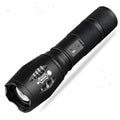 Shustar LED flashlight black 10W rechargeable torch camping light on table