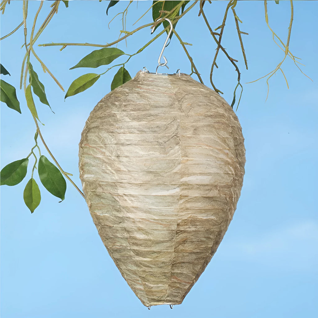 A rectangular photo colour beehive lantern with a honeycomb paper structure and wire frame.