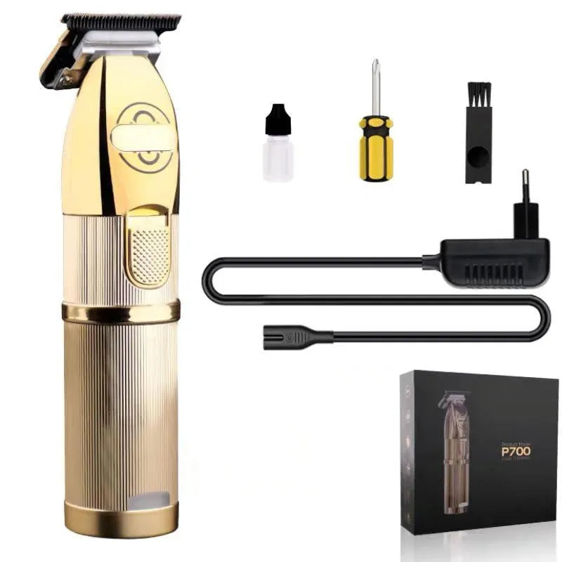 Gold coloured cordless barber hair clipper with charging port and cutting blades