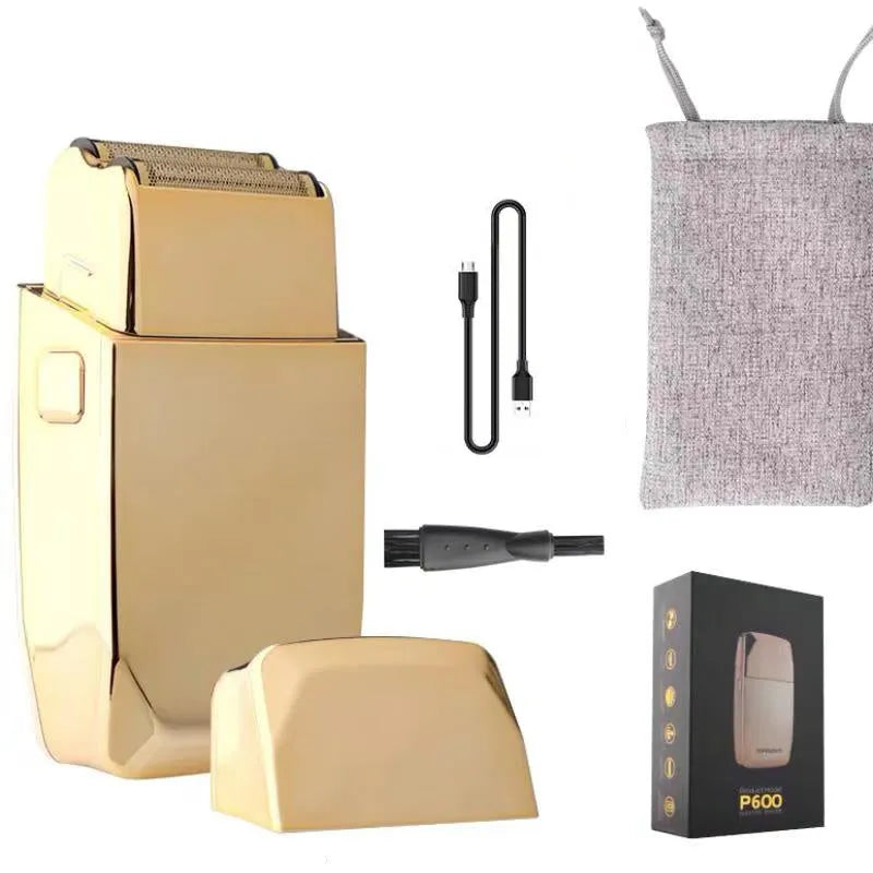 Gold coloured cordless barber hair clipper with charging port and cutting blades