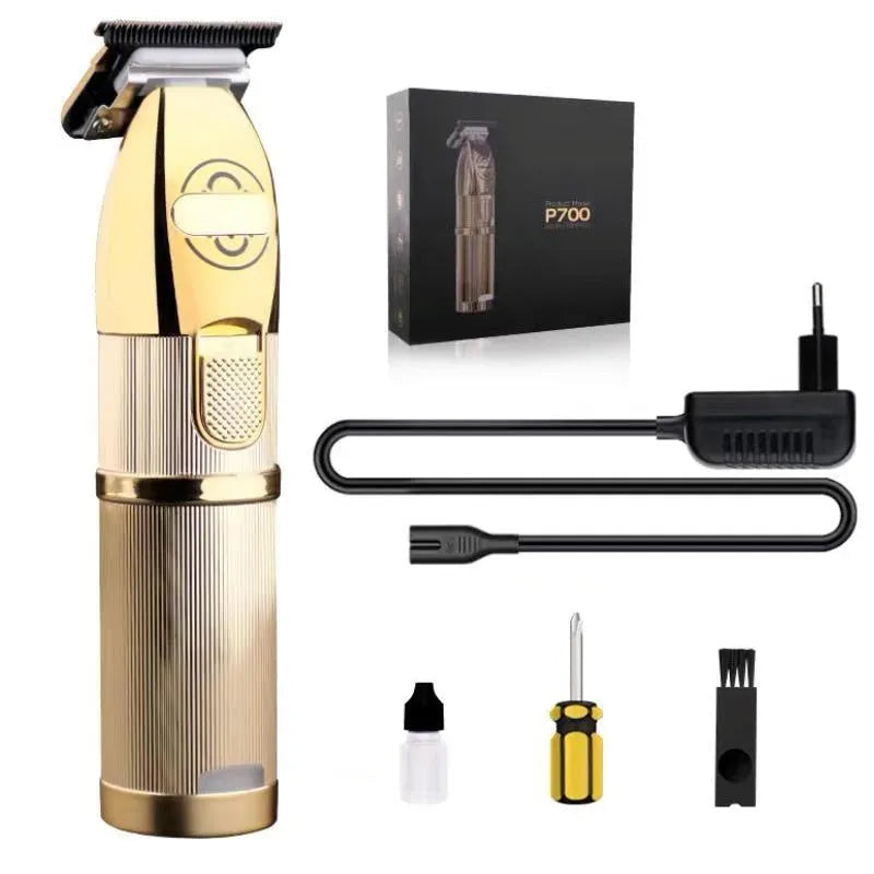Gold coloured cordless barber hair clipper with charging port and cutting blades