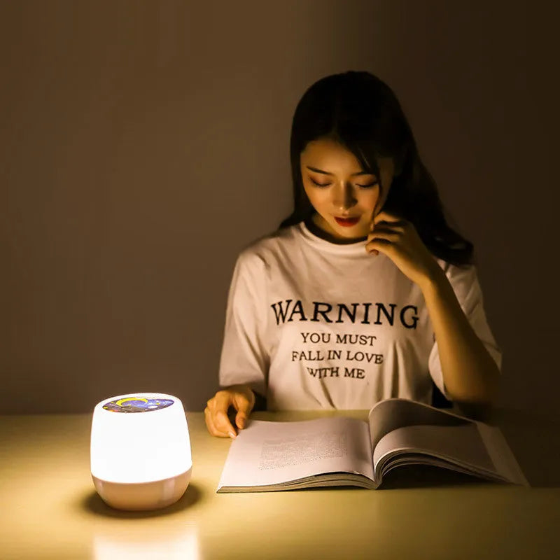 Pruixin LED projector night light projecting rotating star patterns on bedroom wall