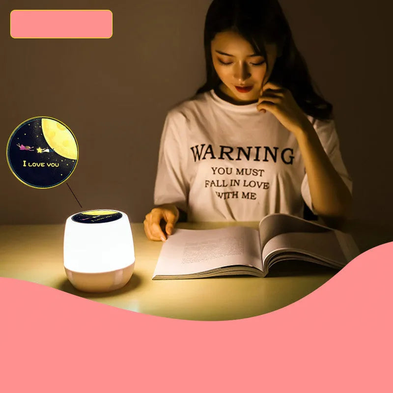 Pruixin LED projector night light projecting rotating star patterns on bedroom wall