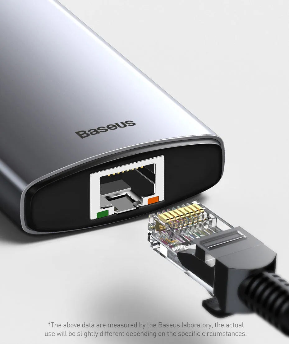 Baseus Metal Shimmer Series 5-in-1 USB-C hub in Space Gray with HDMI and USB ports on a desk