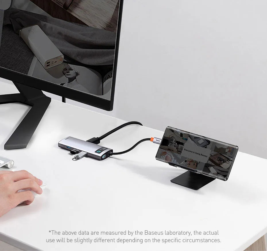 Baseus Metal Shimmer Series 5-in-1 USB-C hub in Space Gray with HDMI and USB ports on a desk