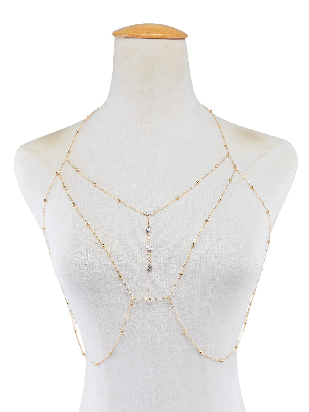 Rhinestone tassel body bra chain in gold with adjustable alloy snake bone chain on woman torso