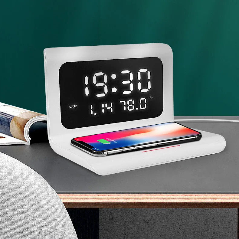 Wireless charger alarm clock with calendar display showing time, date, temperature and humidity