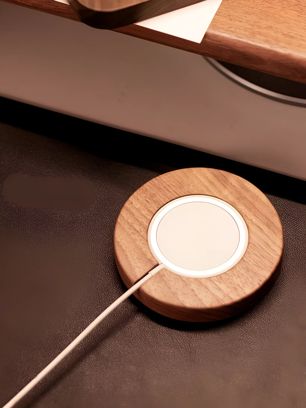 Walnut wood magnetic wireless charger base with iPhone on Magsafe charging pad