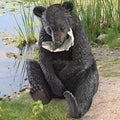 Electric shock LED fly-killing lamp in resin bear shape with Bear Catches Fish colour option on a kitchen countertop