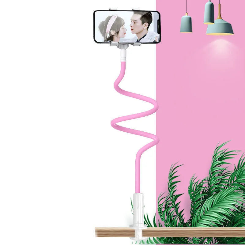Blue adjustable mobile phone holder with memory alloy hose on a wooden bedside table.