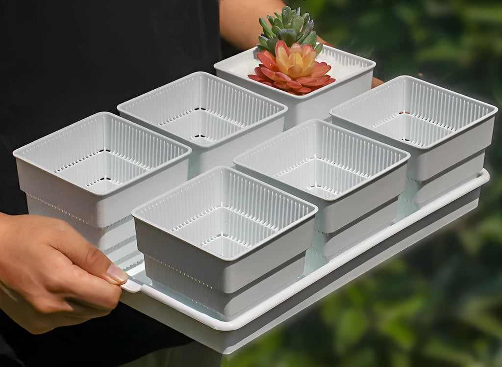 Black and white resin flower pots with breathable design for root control