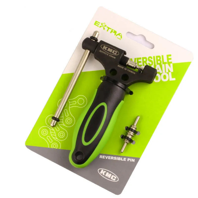 Green steel bicycle chain cutter tool with double shaft chaining device on a workbench