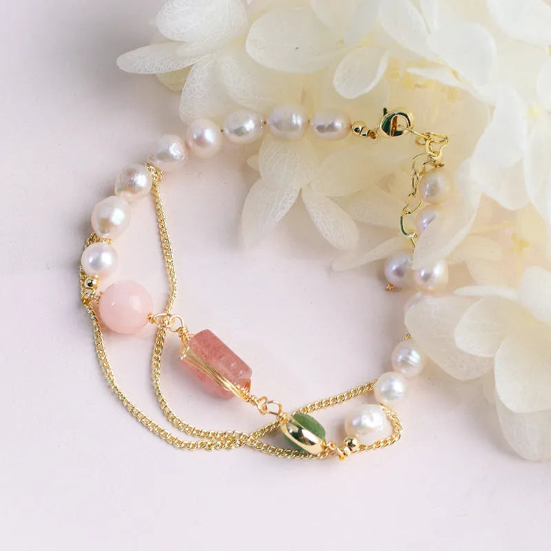 Pink freshwater pearl bracelet with strawberry quartz crystals and geometric metal charms