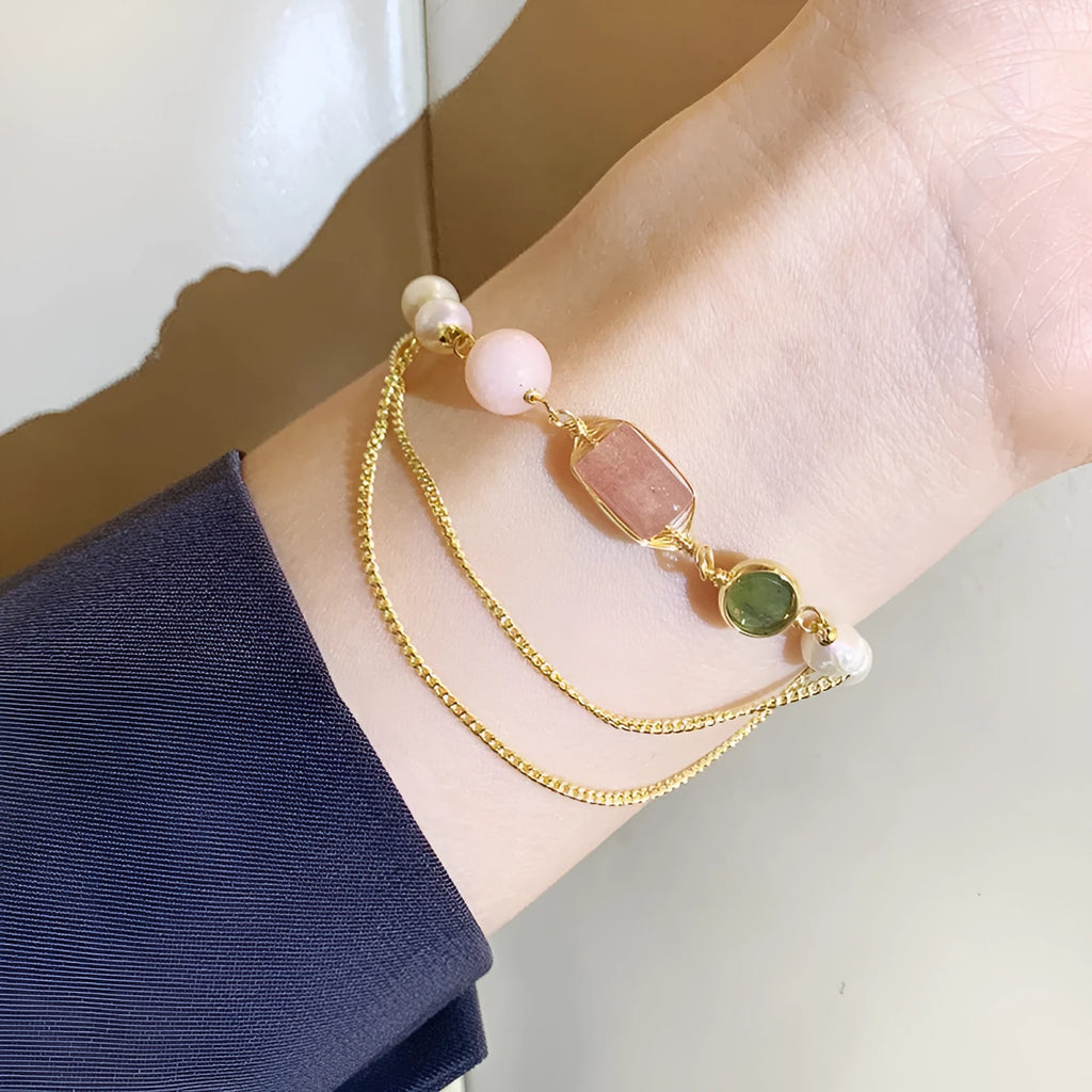 Pink freshwater pearl bracelet with strawberry quartz crystals and geometric metal charms