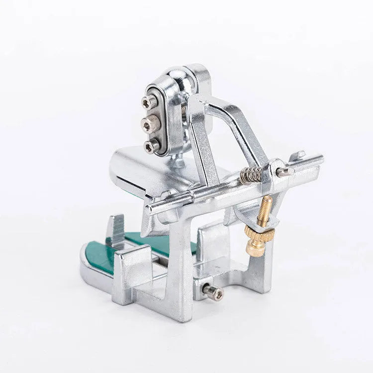 Korean dental articulator showing three adjustable settings and plastic construction