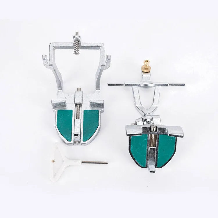 Korean dental articulator showing three adjustable settings and plastic construction