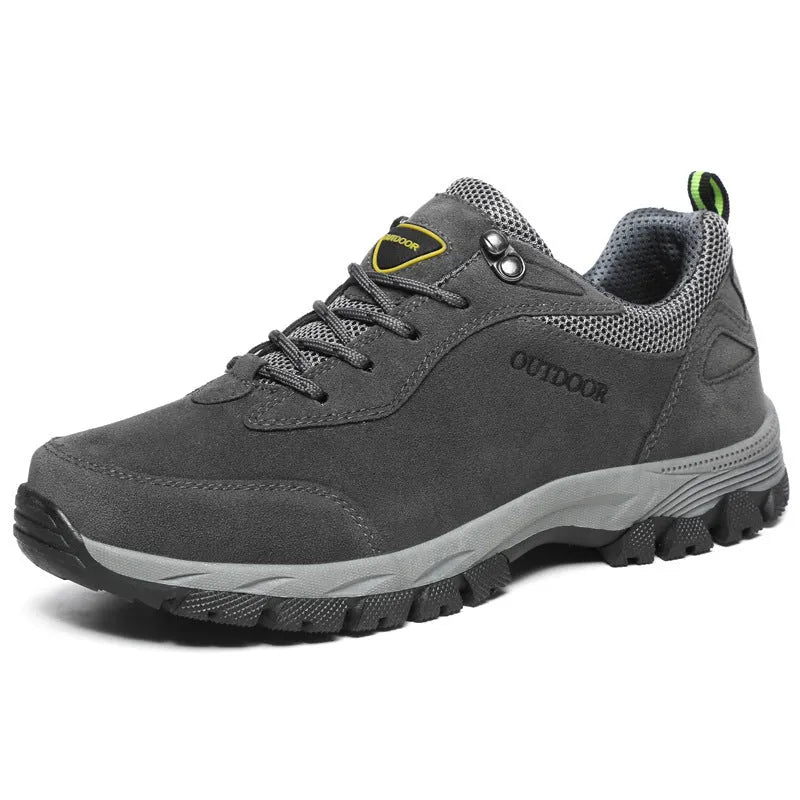 Men's low-cut hiking shoe in army green with mesh upper, shown from the side.