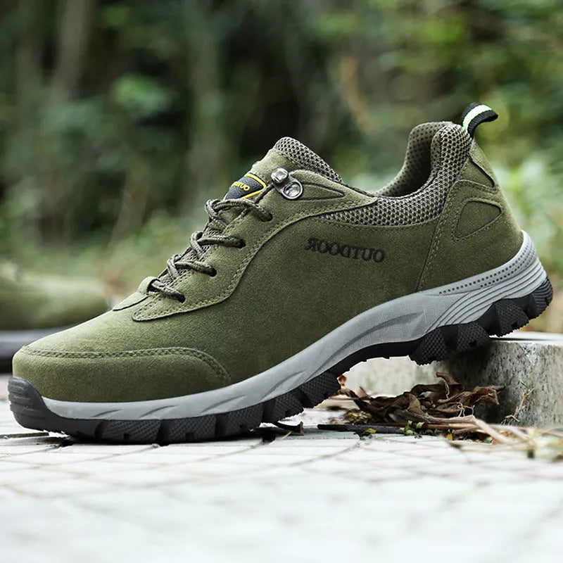 Men's low-cut hiking shoe in army green with mesh upper, shown from the side.