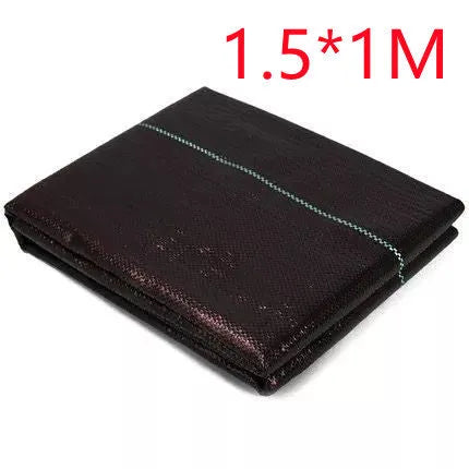 Black plastic woven weed-proof cloth laid flat on soil.