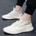 Men's low-top white mesh sports shoes with rubber sole and front-tie laces on a plain background.
