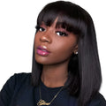 Machine-made human hair wig in natural black colour showing 10 inch length on display stand