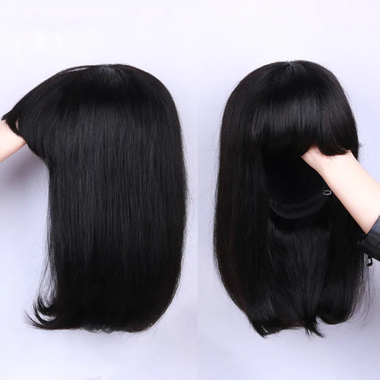 Machine-made human hair wig in natural black colour showing 10 inch length on display stand