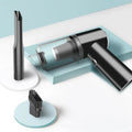 Wireless car vacuum cleaner in black colour with compact portable design for vehicle interior cleaning