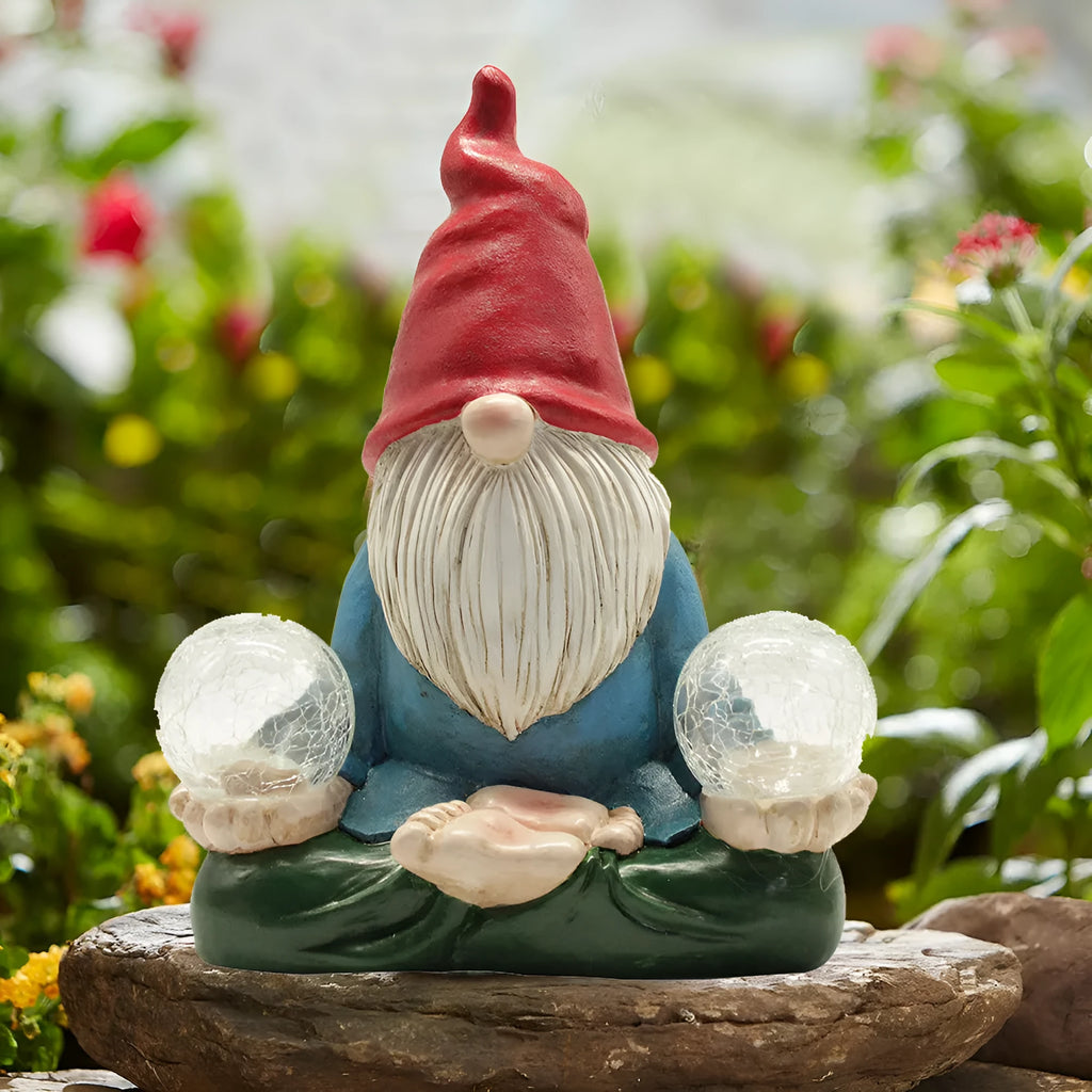 Solar LED resin dwarf doll garden ornament with 'Faceless Old Man' design on grass.