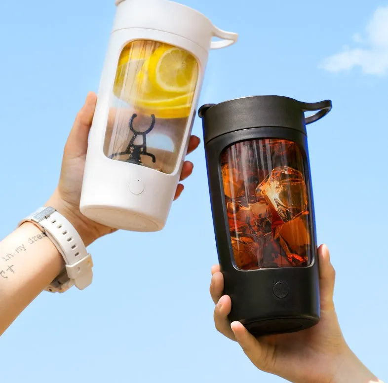 Portable white juice blender cup with 650ml capacity and USB charging port.