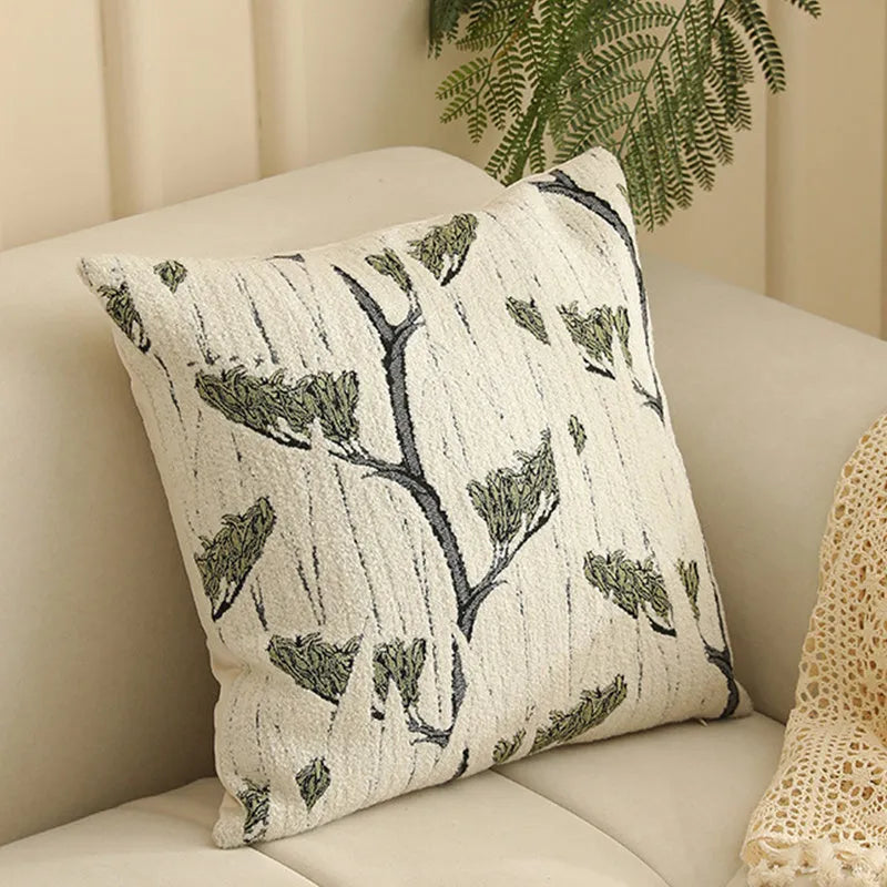 Yarn-dyed jacquard floral pattern cushion cover in 45x45cm size on a grey sofa.
