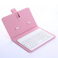 Bluetooth keyboard holster in black with phone inserted, showing stand function and keyboard layout