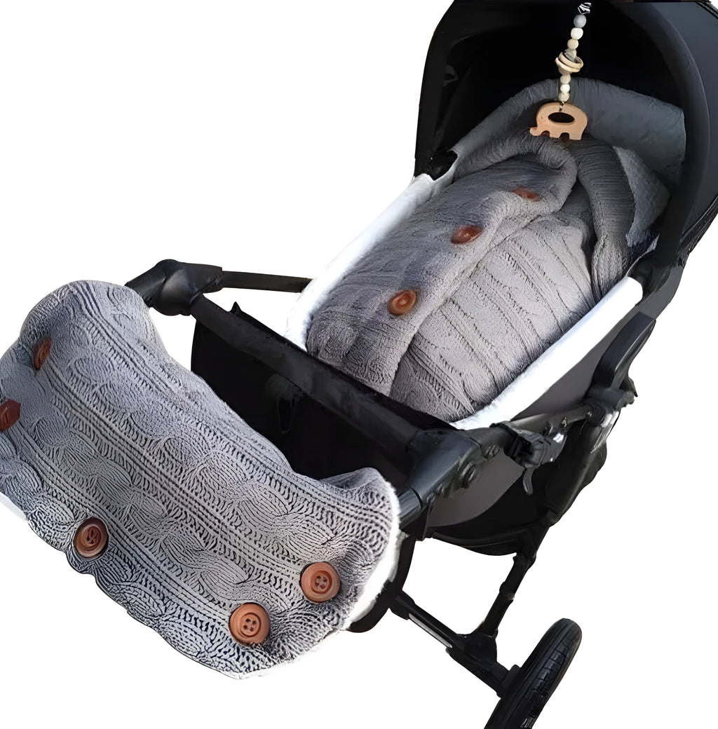Baby sleeping bag in beige with button opening and matching pram handrail set