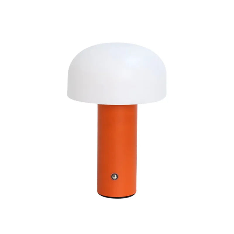 USB-powered plastic table lamp in a choice of black, green, orange, or white colour styles on a desk.