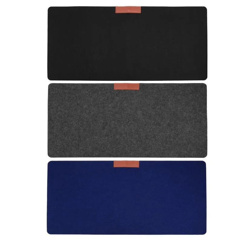 Felt gaming keyboard pad in 30x60cm size, single-sided, black colour, on desk with keyboard and mouse