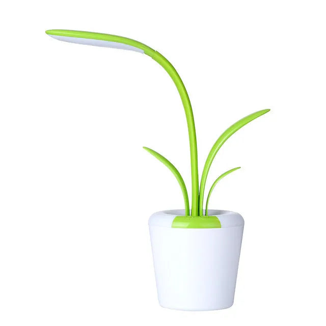 Modern rechargeable LED table lamp in blue with stylised plant shape on end table