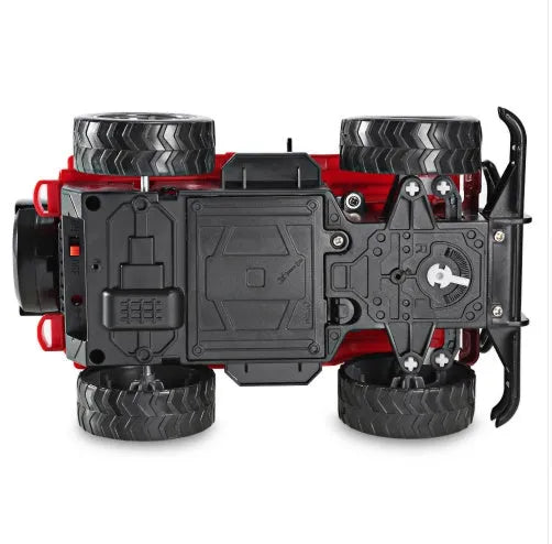 Wrangler Knight remote control off-road car in red on a grass surface with controller