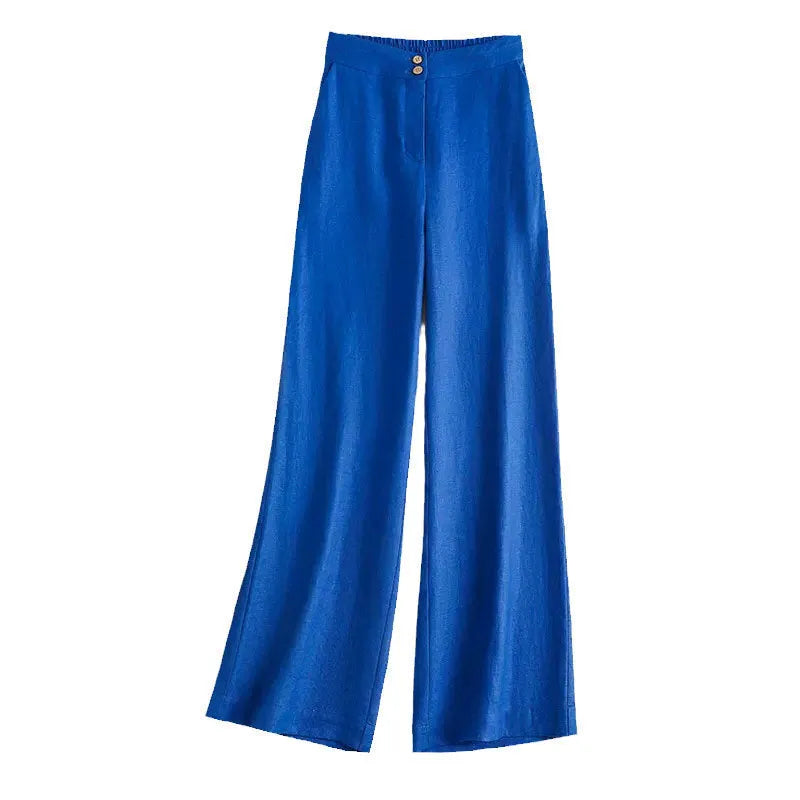Woman wearing high-waist wide-leg casual trousers in a cotton-linen blend, shown in earth gold colour.