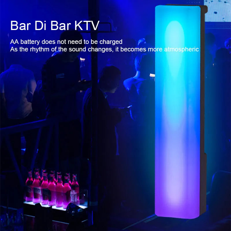 3D RGB table lamp with colourful rhythm lighting on desk beside gaming PC