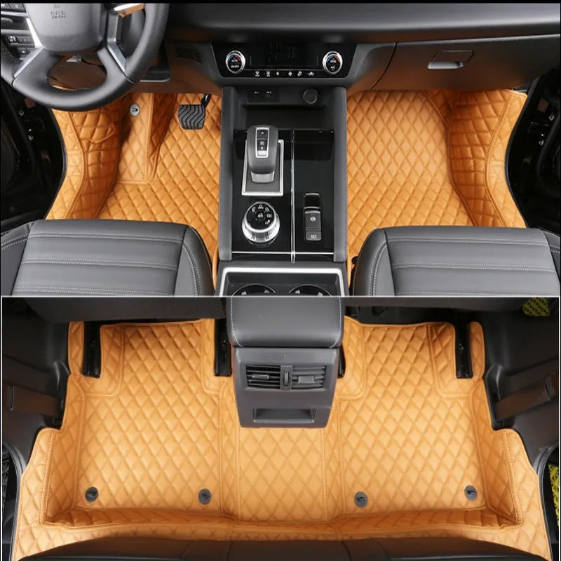 Custom black floor mats fitted in a 2023 Mitsubishi Outlander footwell
